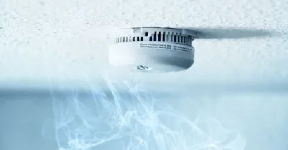 Smoke detector mounted on a residential ceiling